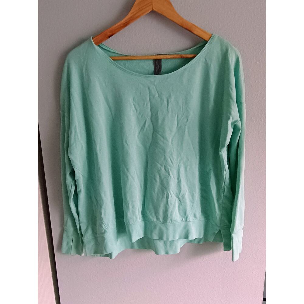 Sweaty Betty Simhasana Pullover in a mint green color small teal beachy coastal